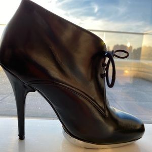 black ankle leather boots with silver platform
